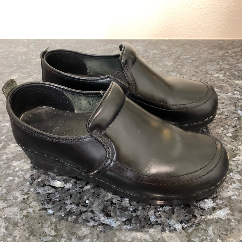 Dansko black leather clogs